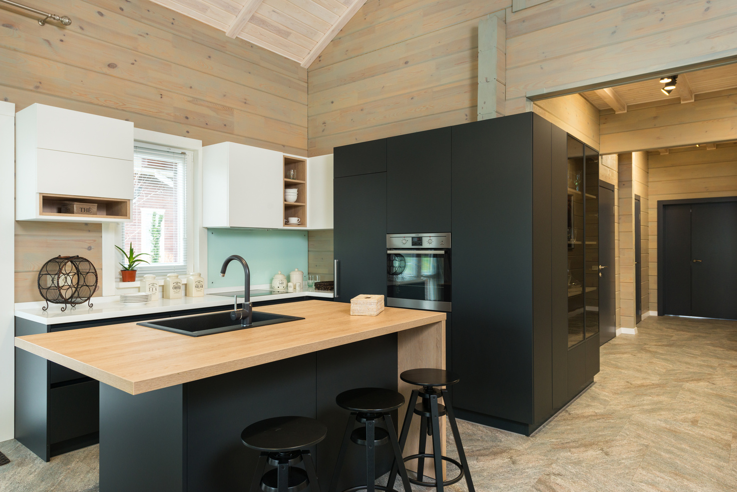 Modern kitchen with matte furniture in big house